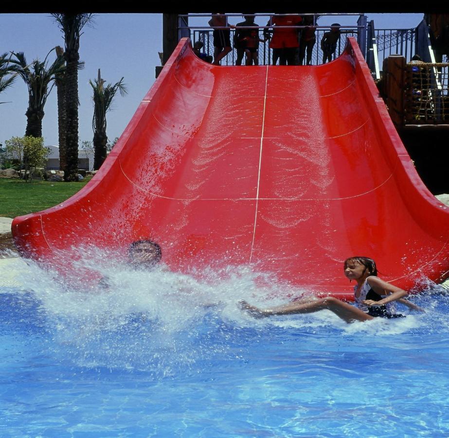 Sharm Dreams Vacation Club - Aqua Park 호텔 외부 사진 A water slide