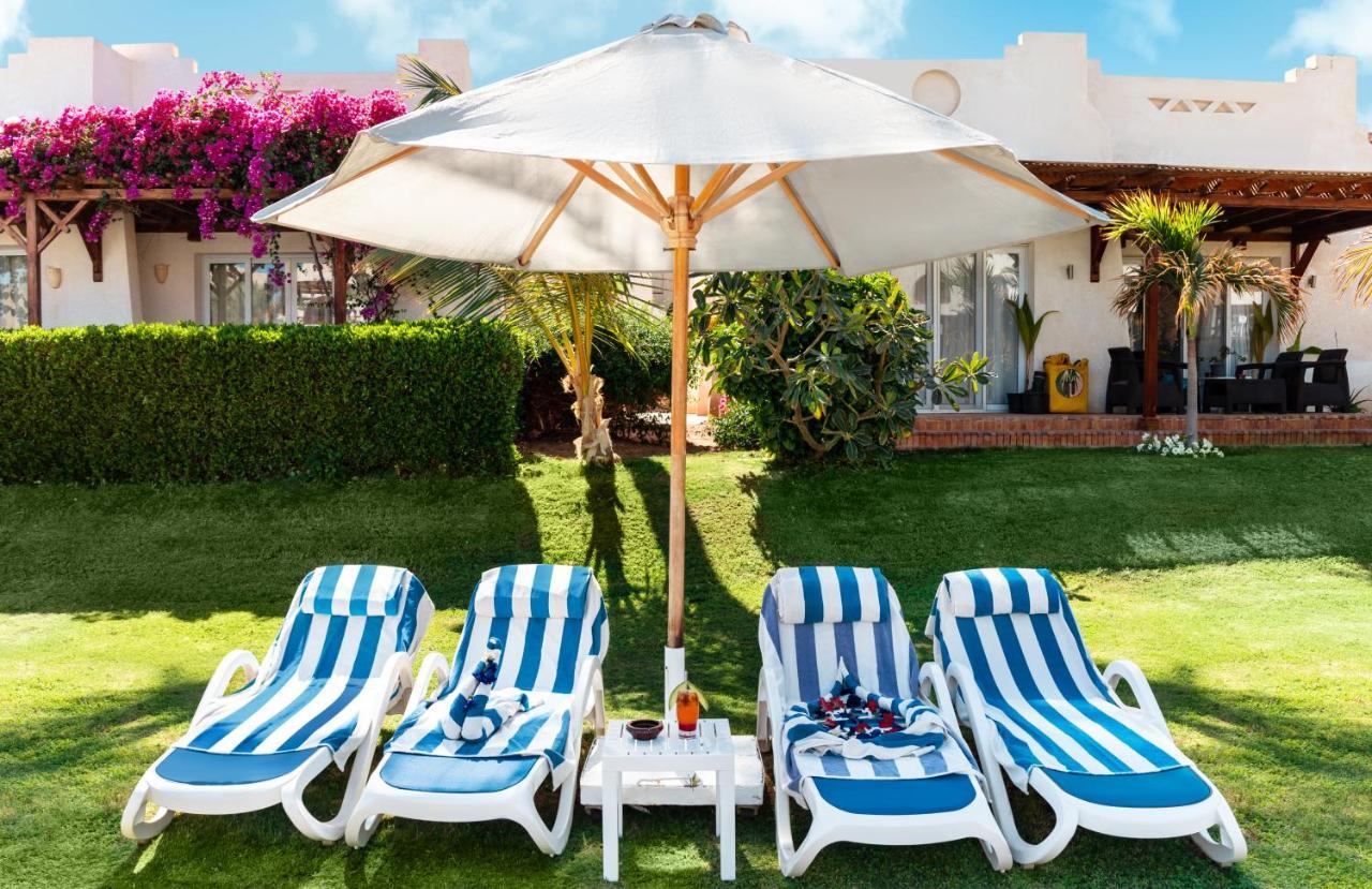 Sharm Dreams Vacation Club - Aqua Park 호텔 외부 사진 A patio umbrella
