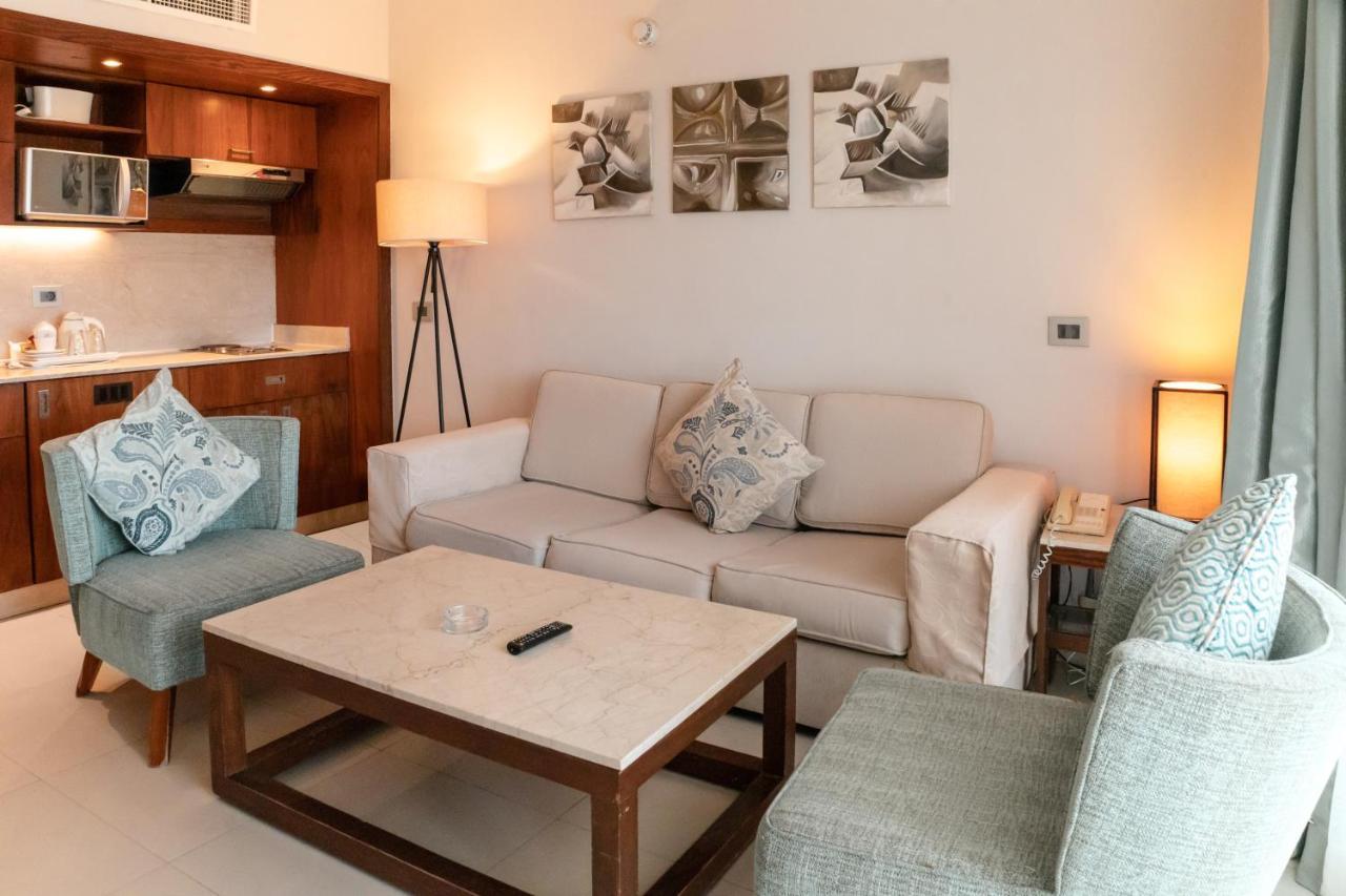 Sharm Dreams Vacation Club - Aqua Park 호텔 외부 사진 A living room in a hotel