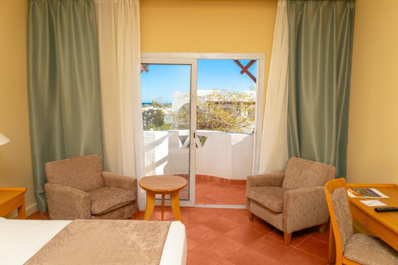 Sharm Dreams Vacation Club - Aqua Park 호텔 외부 사진 A room at the hotel