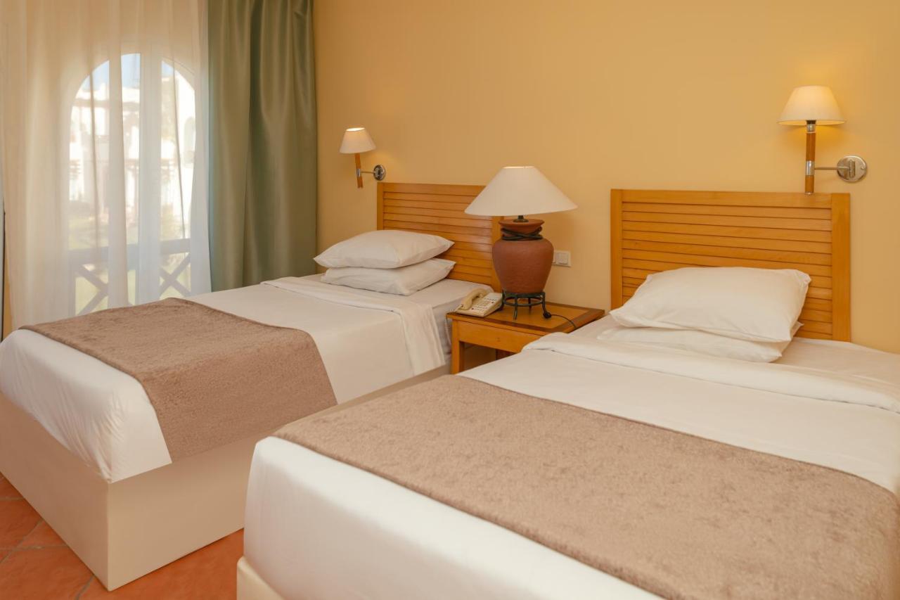 Sharm Dreams Vacation Club - Aqua Park 호텔 외부 사진 A bedroom