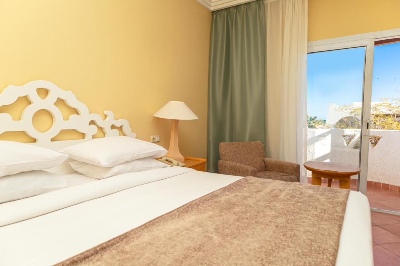 Sharm Dreams Vacation Club - Aqua Park 호텔 외부 사진 A bedroom at the hotel